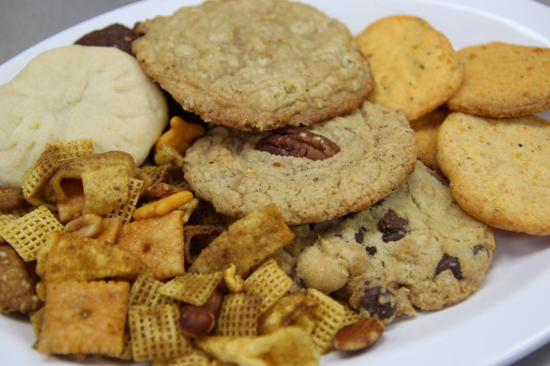 Happy hour cocktail mix with sugar babies, oatmeal and pecan toffee cookies, lemon citrus teacakes and shortbread crackers (also known at _cheese straws_).JPG